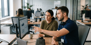 Recruiter helping with fraud on laptop