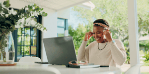Woman working from home on her computer
