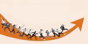 Professionals running up orange arrow