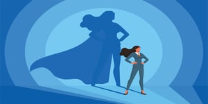 Business woman with superhero shadow