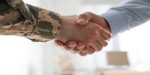 Military Shaking hand with Corporate Office worker