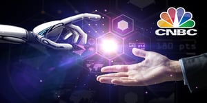 Robot hand and human hand interacting-CNBC logo top right corner
