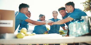 Team building volunteer charity group hands