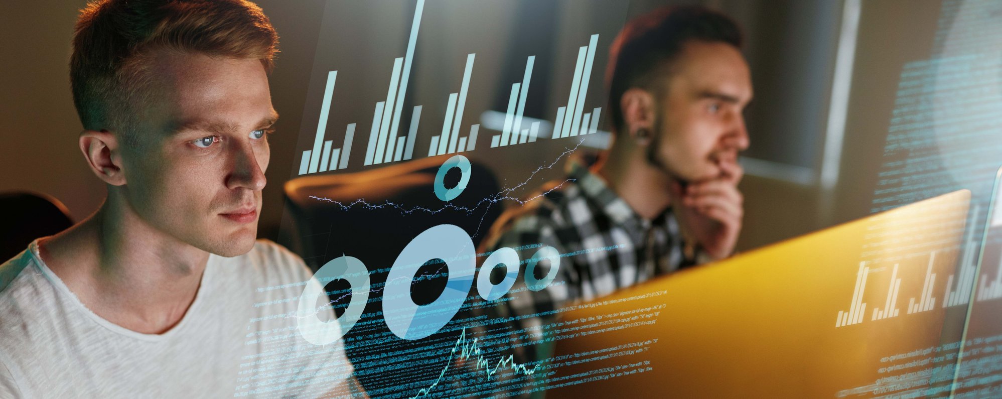 Two men looking at a screen