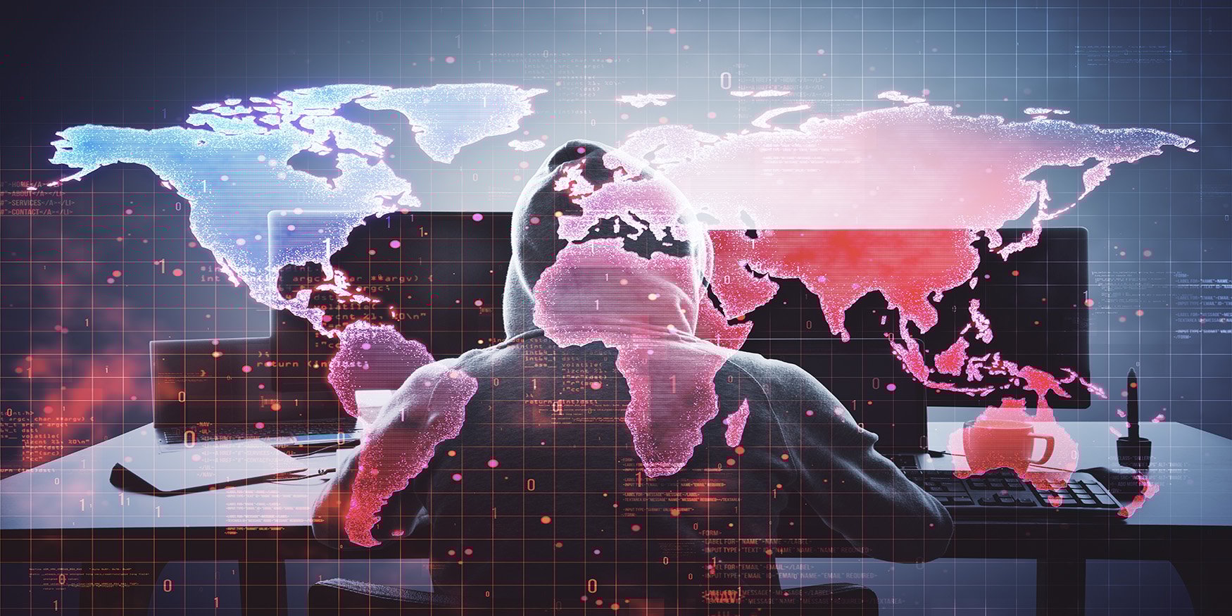 hacker in hoodie using computer digital world map