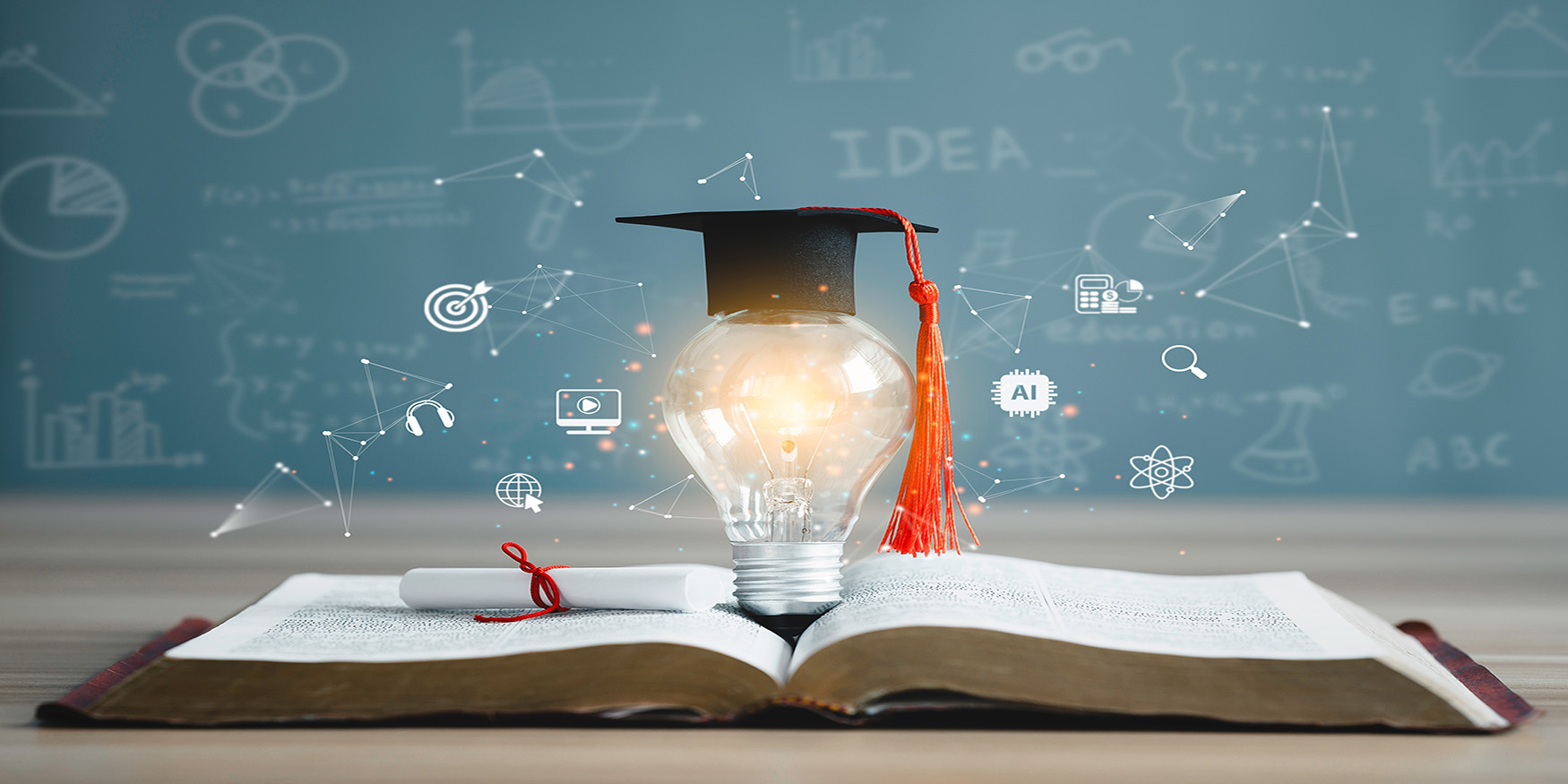 graduation cap lightbulb on book icon