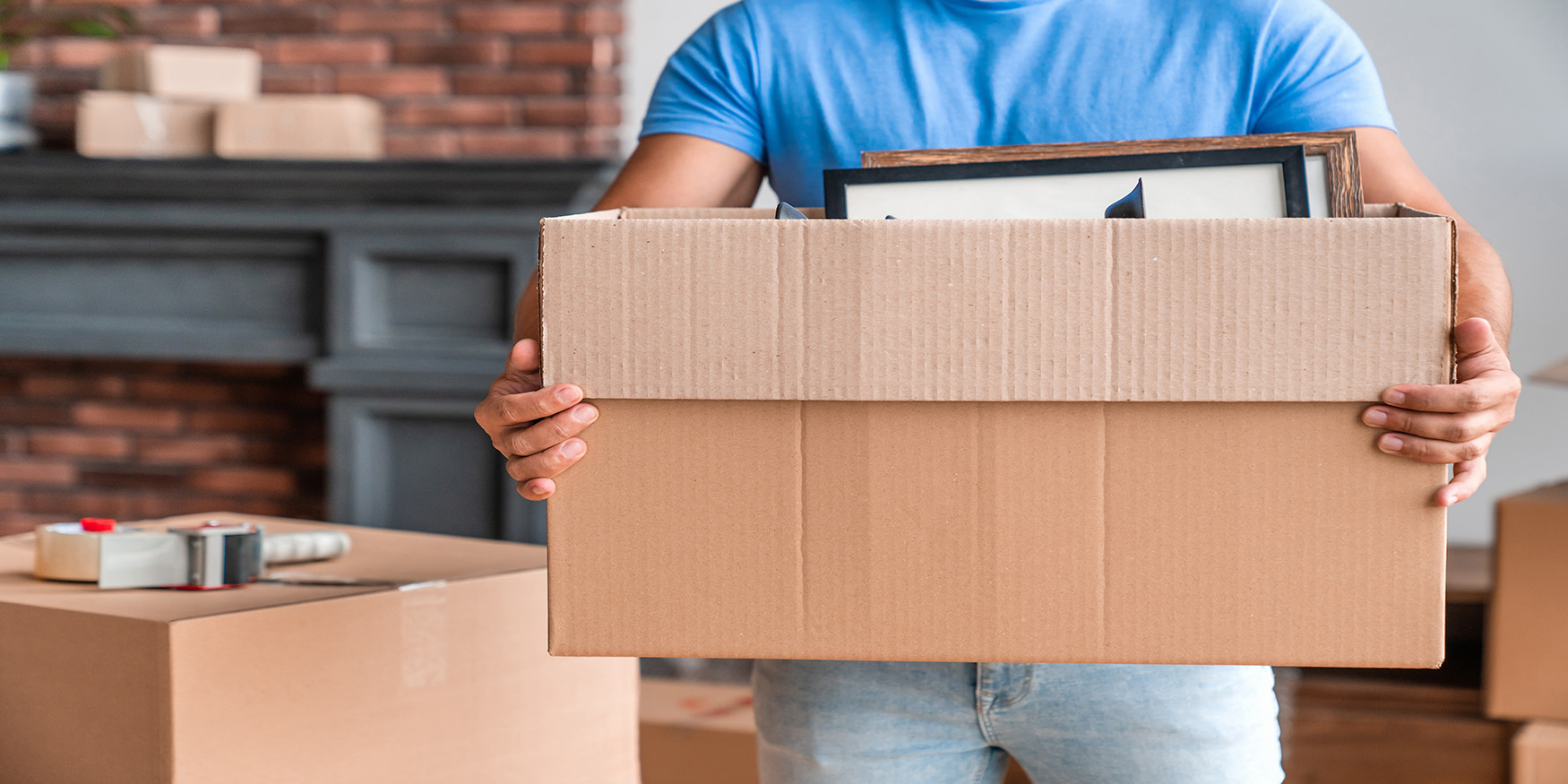 cropped image man carrying boxes full
