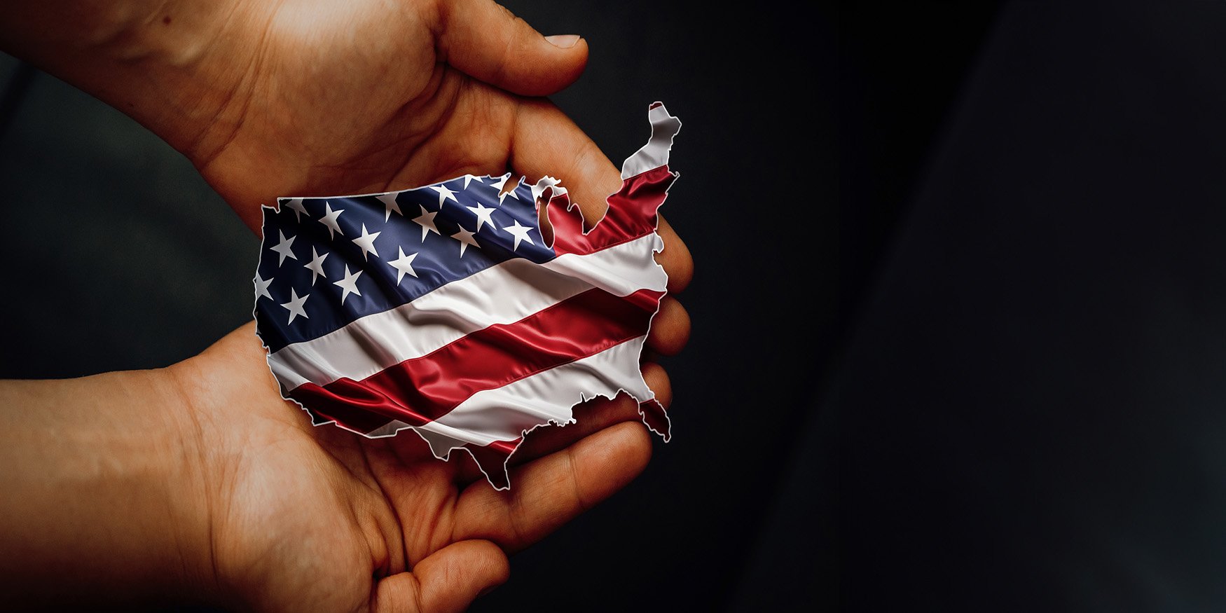 male hands holding flag united states of america