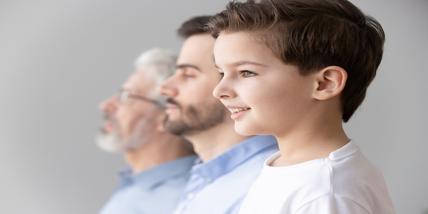 Generations lined up from child to middle age to older adult