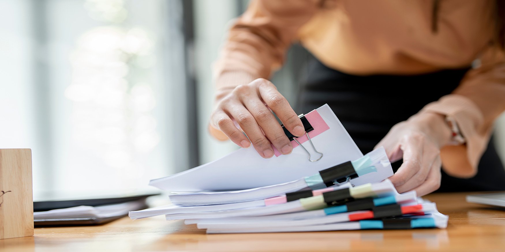 Going through papers in an office